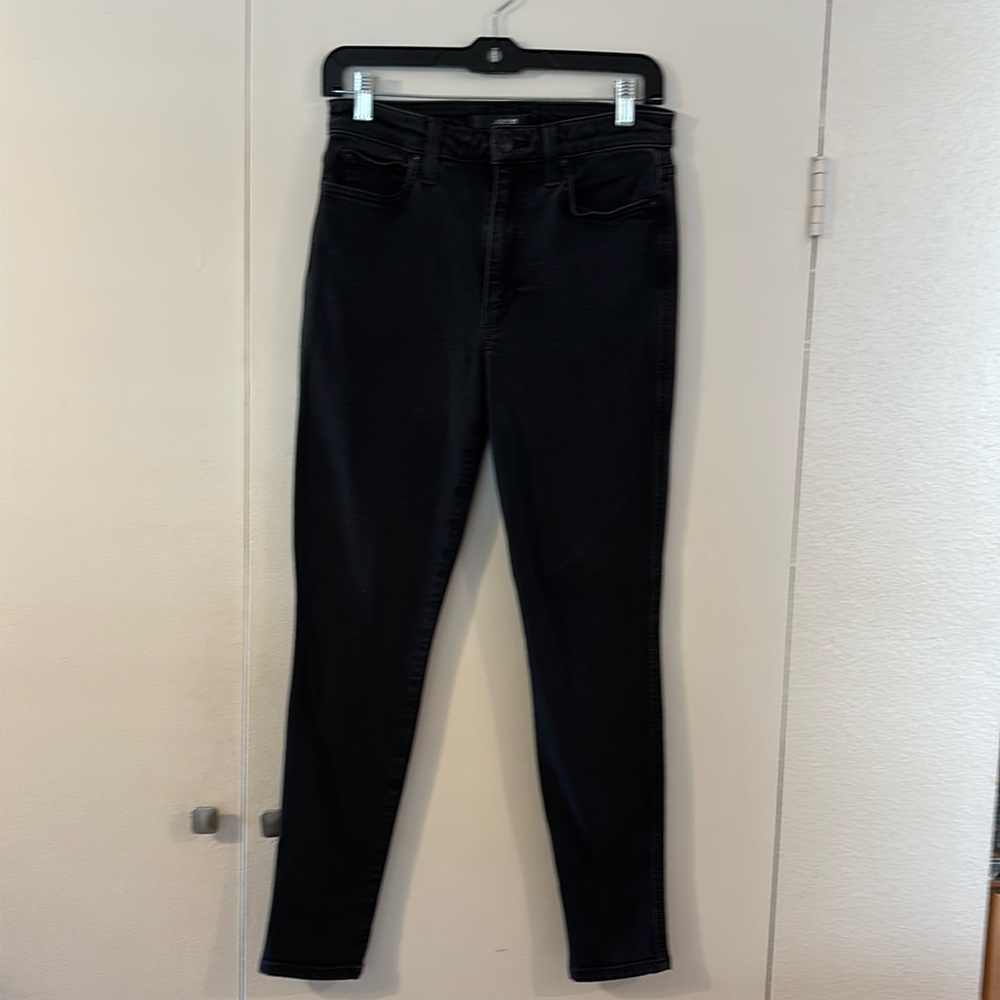 Joe’s Jeans “The Charlie” skinny black stretch with slight fade and lightly used